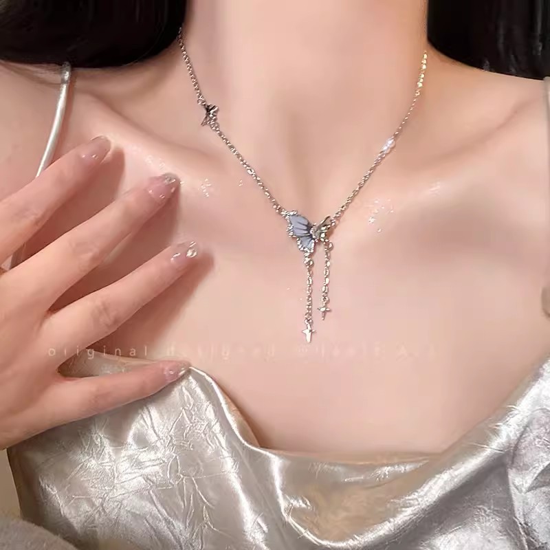 Silver Starburst Butterfly Tassel Necklace