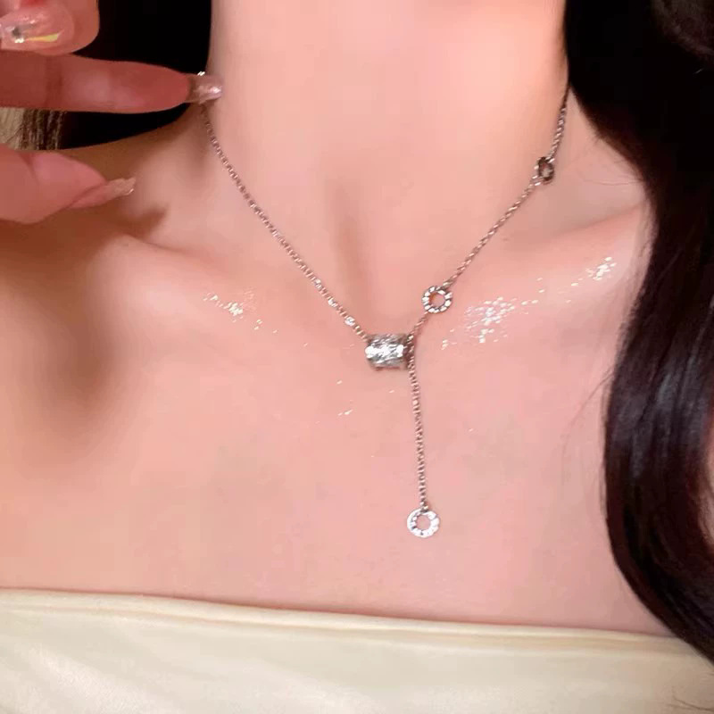 Silver Hourglass CZ Lariat Tassel Necklace
